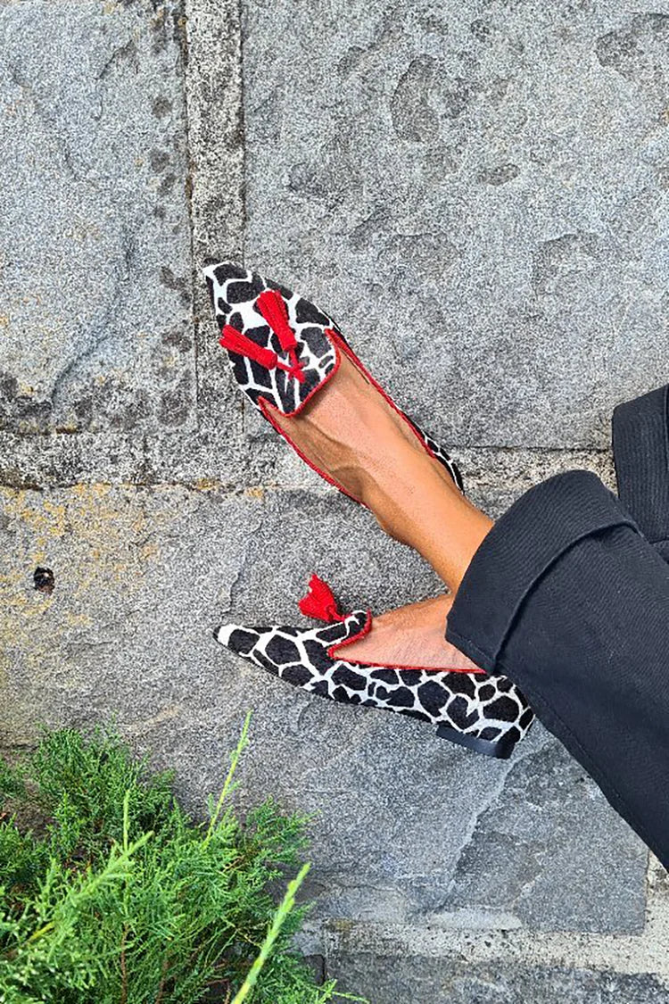 Jocelyn - Animal print loafers with red fringes
